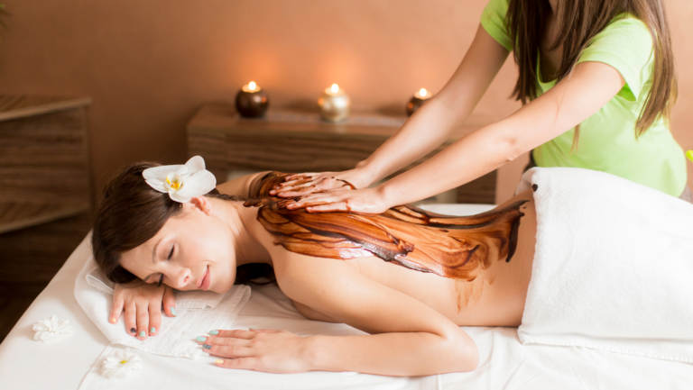 a woman getting chocolate massage